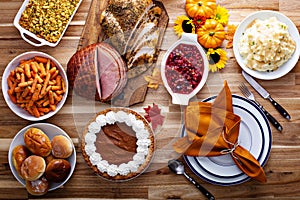 Thanksgiving table with turkey and sides