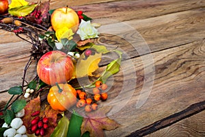 Thanksgiving wreath with pumpkin, apples, barberry, rowan, copy