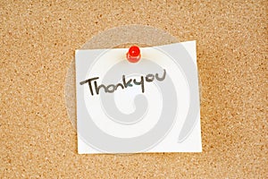 Thankyou note pinned to a corkboard