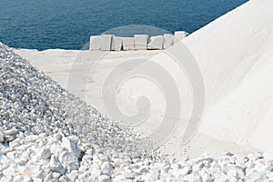 Thassos white marble (dolomite) quarry, Saliara Beach, the Aegean sea coastline, Greece. Global stone industry