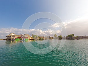 Thatch huts / wooden houses at kuna yala village on island , photo