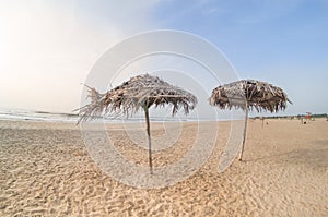 Thatch umbrellas on paradise beach in pondicherry chennai