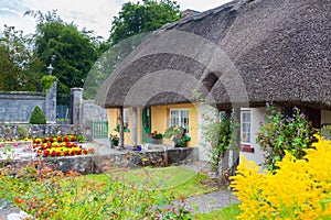 Thatched cottage in Adare, Ireland photo