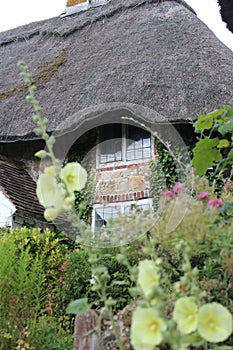 Thatched Cottage in Rural England in Summer.