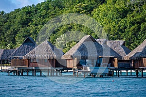 Thatched Huts Built Over the Water