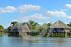 View of the tourist complex in the form of the Indian village of Guama in the Zapata National Park, Cuba photo