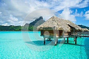 Thatched roof honeymoon bungalow on Bora Bora