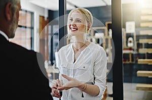 Thats a great idea. Cropped shot of two businesspeople talking while standing in the office.