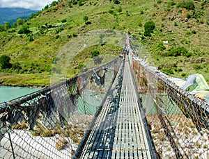 The520 feet high suspension bridge in Bhutan anchored at the bank of Tsang  river with interlocking beam and cantilevel and