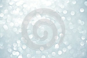 TheAbstract bokeh lighting background , silver color tone