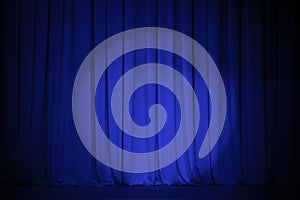 Theater blue curtain with light spot