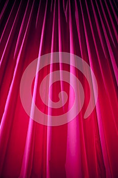 Theater curtain with dramatic lighting