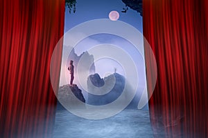 Theater performance with a red curtain opening