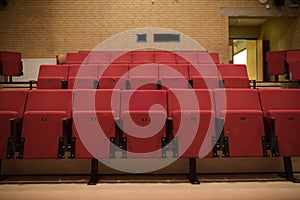 Theater room with red chairs in a school