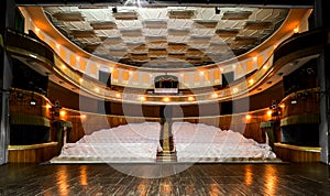 Theater stage and auditorium with balconies and loggias photo