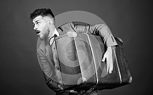 Theft of century. Thief run away with heavy suitcase. Delivery service. Travel and baggage concept. Hipster traveler