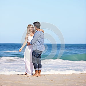 Their love will last a lifetime. a happy young couple enjoying a romantic day on the beach.