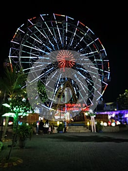 theme park wheel night ferris