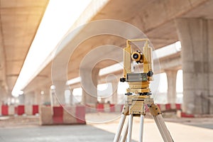 Theodolite for Civil Engineers at road construction site. Highway. Surveyor equipment