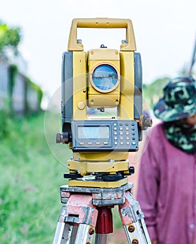 Theodolite staying on tripod, catch from below