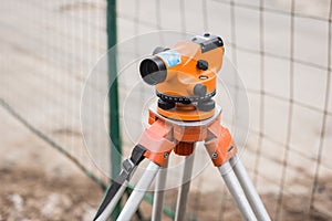 Theodolite tool is a construction measuring instrument in an industrial area or on a construction site survey equipment