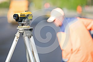 Theodolite tool at construction site during road works