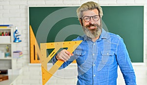 Theorem. Talented teacher. Math subject. Geometry and algebra. Science concept. Mature bearded teacher in glasses