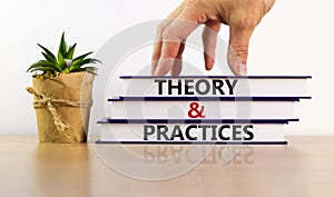 Theory and practices symbol. Books with words `Theory and practices`. Beautiful wooden table, white background. Business and