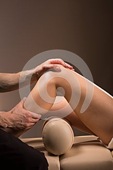 Therapeutic knee massage photo