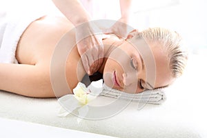 Therapeutic massage, heals the pain and relaxes photo