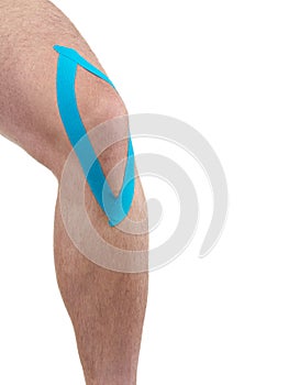 Therapeutic treatment of knee with kinesio tex tape.