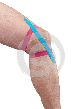 Therapeutic treatment of knee with kinesio tex tape.