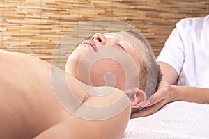 The therapist does craniosacral therapy