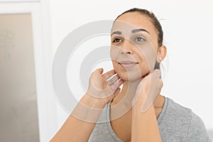 Therapist examines a young girl patient. Throat in neck, thyroid enlargement