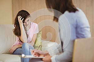 Therapist listening to her patient