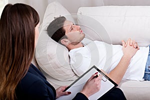 Therapist working with patient on hypnosis