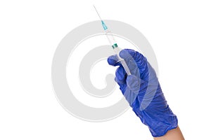Therapy treatment concept. Cropped close up photo of hand of intern practitioner holding syringe with medicament inside isolated