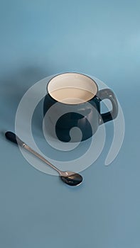 There is a cup of hot milk in the mug