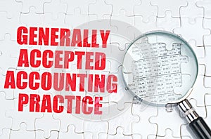 There is a magnifying glass on the puzzles, next to it is written - GENERALLY ACCEPTED ACCOUNTING PRACTICE