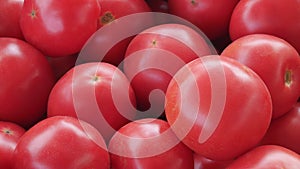 There are many of ripe tomatoes at the rural market.