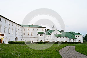 A monastery with green roof photo