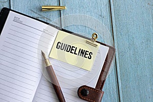 There is notebook with the word Guidelines photo