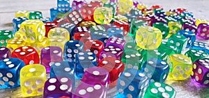 A huge pile of dice in multiple colours