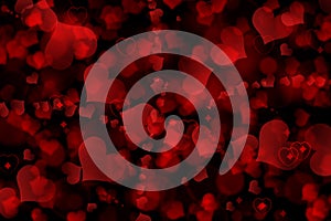 There are red hearts on the black background. Happy Valentine`s Day.