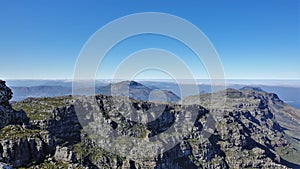 There is scant vegetation on the flat top of Table Mountain