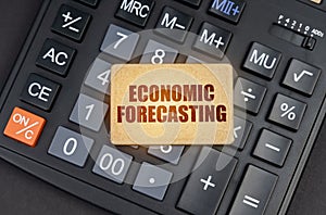 There is a sign on the calculator that says - Economic forecasting