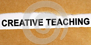 There is a space in the middle of the craft paper, where on a white background the inscription - Creative Teaching