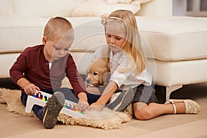 There - told you i could prove string theory. Two young children playing with an abacus.