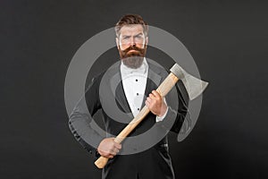 Theres a beard style for every man. Bearded man holding hatchet. Gentleman with ax. Axe shaving