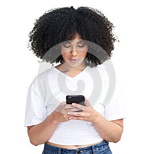 Theres a fine art to phone flirtation. Studio shot of an attractive young woman using a smartphone against a white